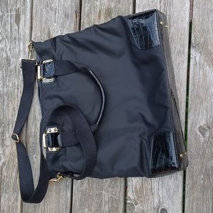 Banana Republic shoulder/hand bag. Black and gold. RN 54023.